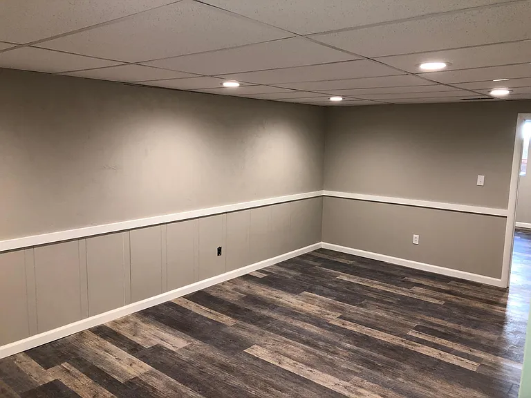 Completely renovated basement family room.