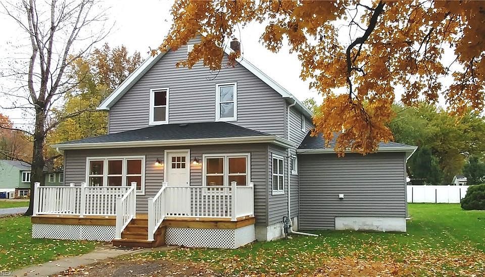 New siding, new front deck, vinyl railing, new roof, new gutters