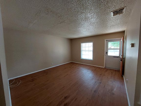 Front entry straight into large living family room.