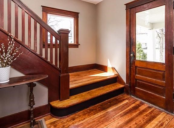 Nice entry with hardwood floors, and a banister wood staircase invite you into this beautiful home.