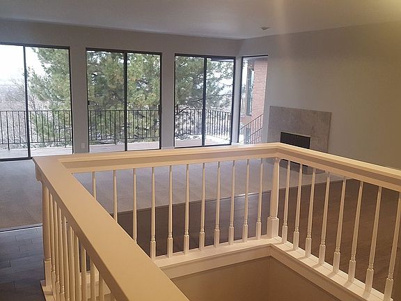 Shiny rail surrounding stair
