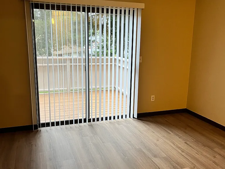 Master Bedroom with Sliding Glass Door and private deck