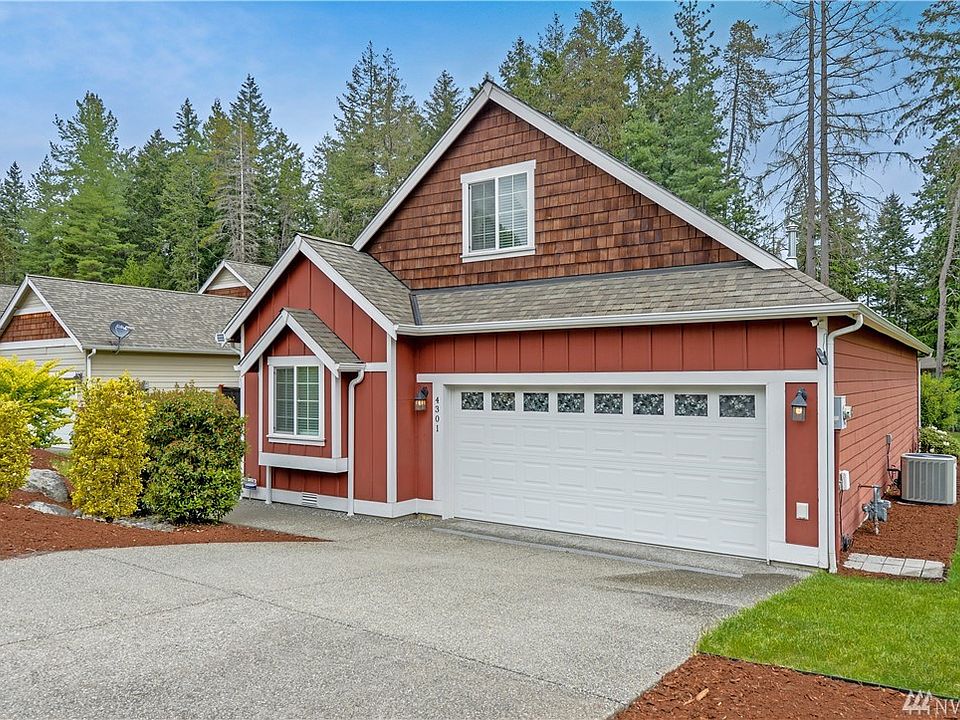 Beautiful home in Turtle Cove on a spacious lot (note the heat pump on the right). 