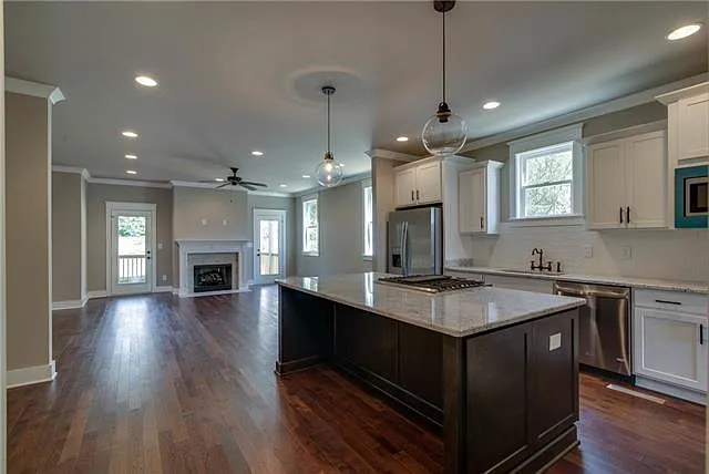Entertainers dream kitchen. Jenn Air range in the center of the island so you can cook meals while conversing with guests.