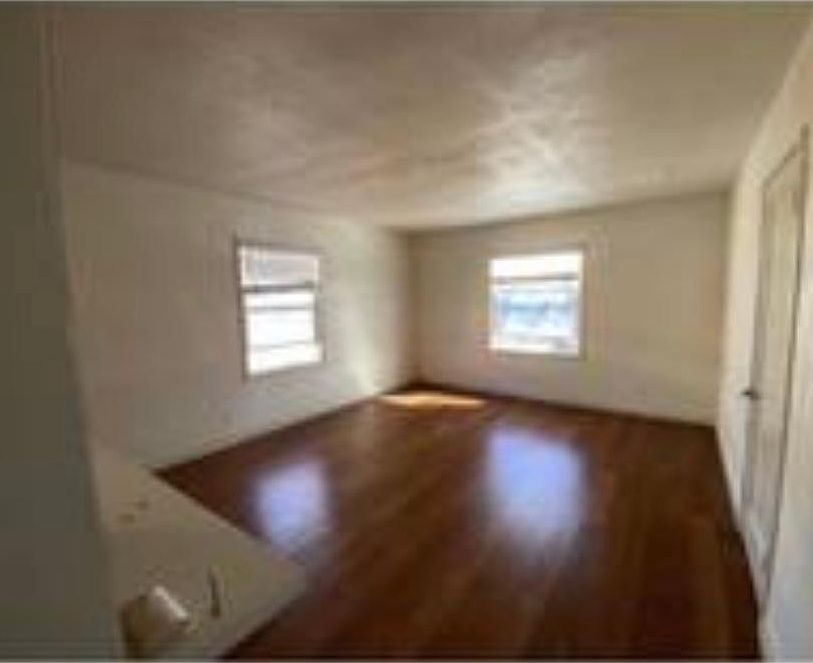 Large Living room facing the street