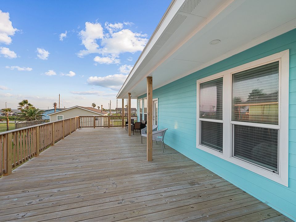 Large deck with beach view and ship channel view, watching the ship go by