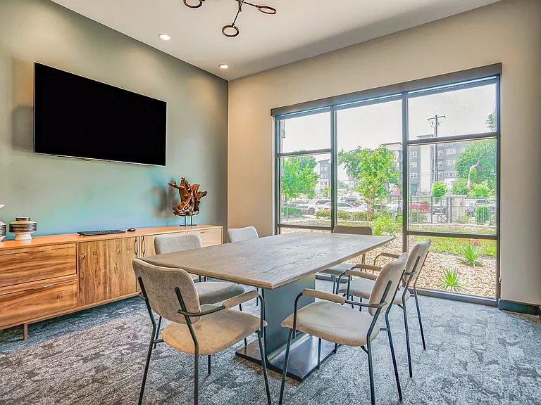 Conference room with projection screen, perfect for meetings or to get work done
