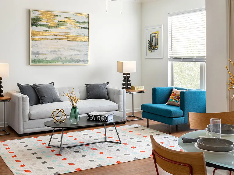 Apartment Living Room and Dining area with wood floors.