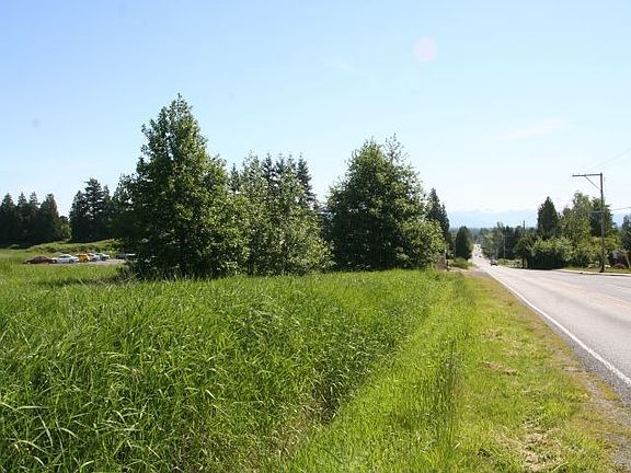 Looking east at property from across Church Rd.