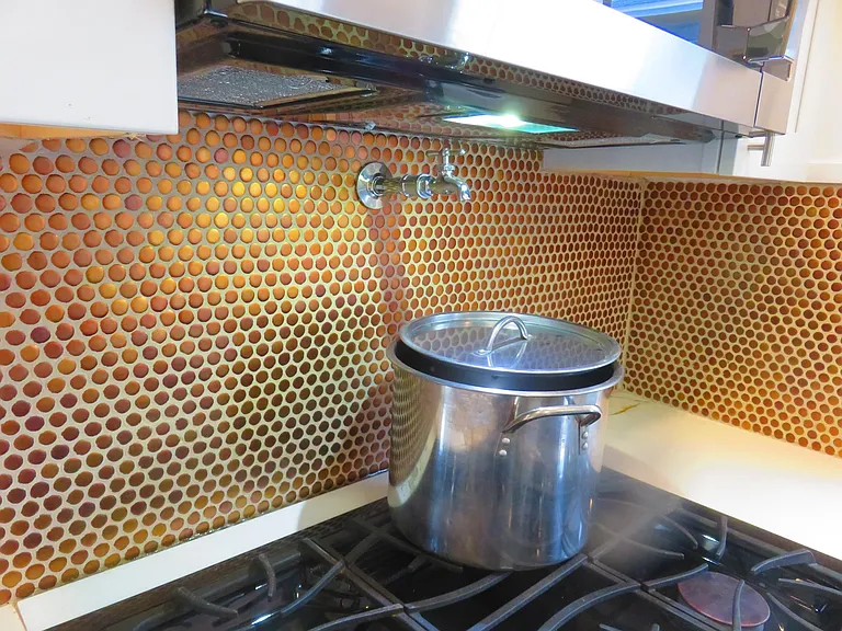 pot-filler faucet over stove