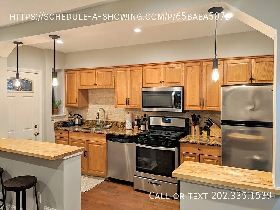 Two-Level 2BR + Bonus Room with Parking & In-Unit Laundry — Photo 3