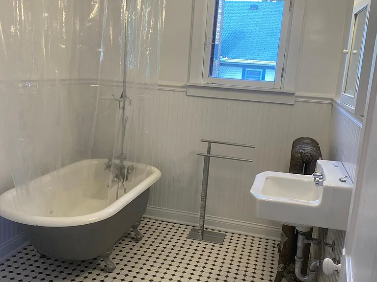 Large, beautiful Bathroom with clawfoot tub