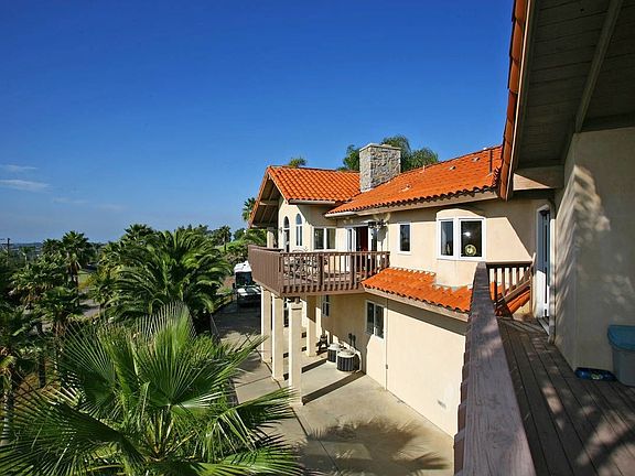 Back of home with full ocean views