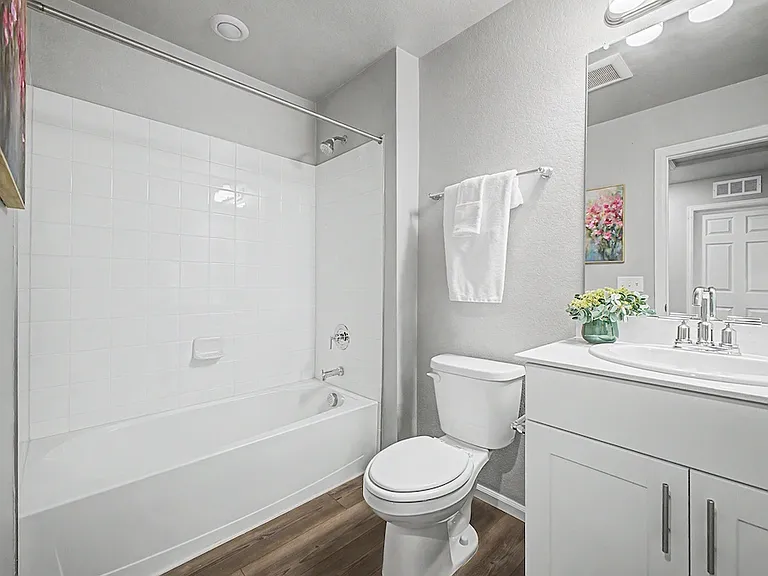 Upstairs second bathroom with a tub