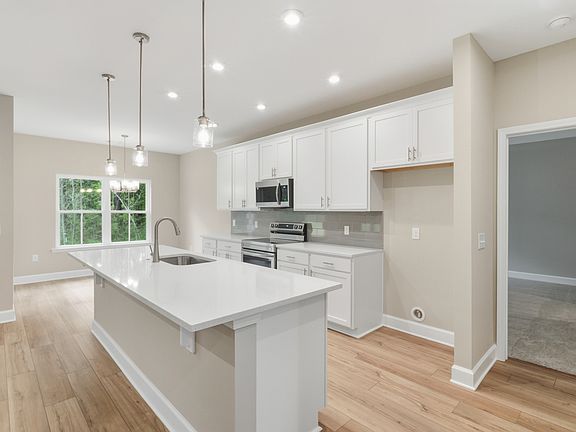 Harbor II - Gourmet Kitchen Center Island Ernest Homes