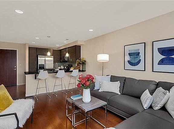 Open floor plan with large counter/eating bar.