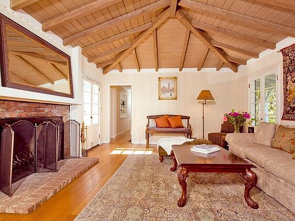 Vaulted Living Room Ceilings and oversize Fireplace