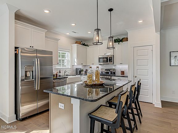 5th image of 8729 Radcliff Drive NW Lot 9