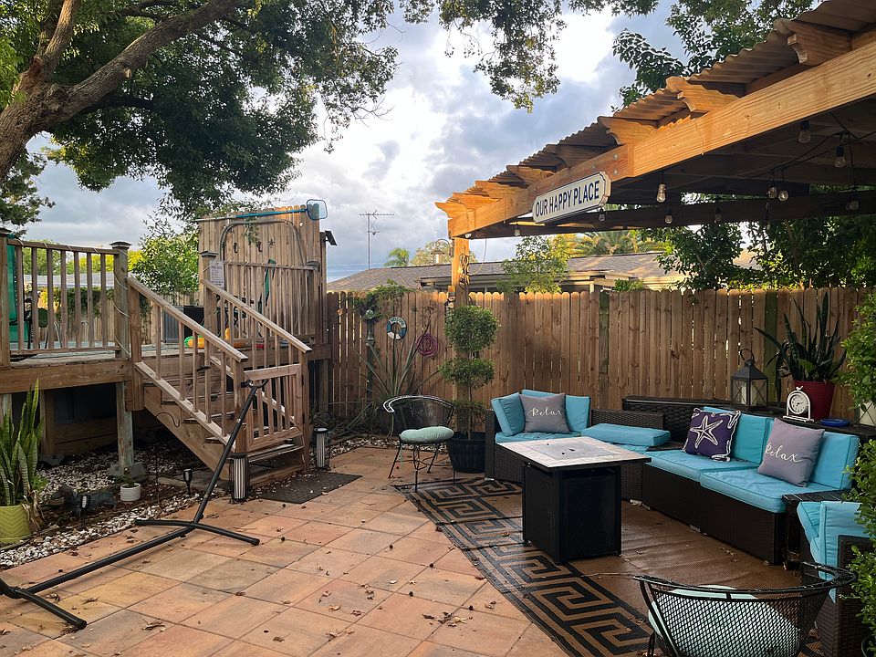 Gazebo and Paver-patio in fenced back yard. (Furniture not included).