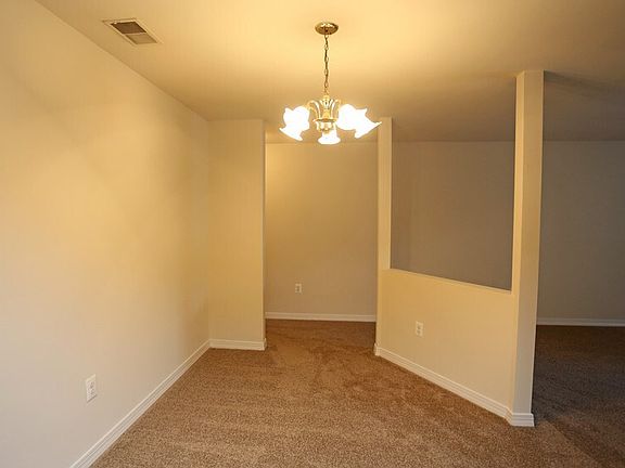Two bedroom dining and living spaces