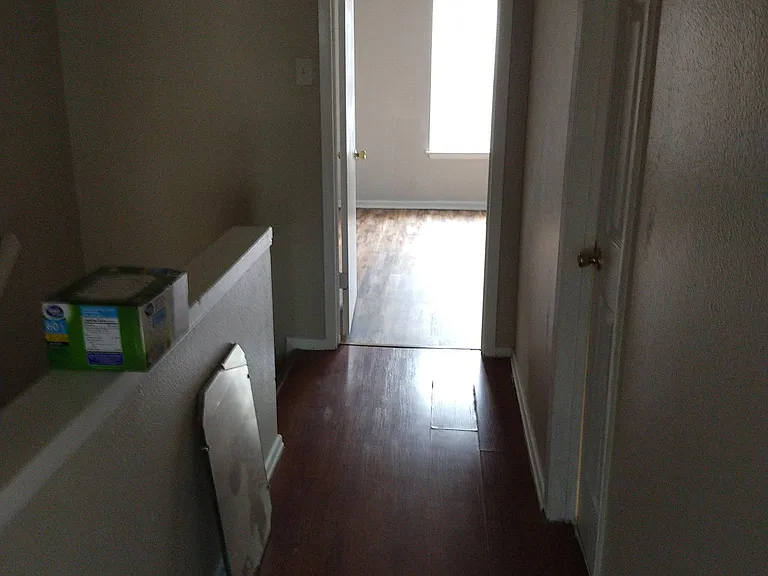 view of the back bedroom in the upstairs hall way