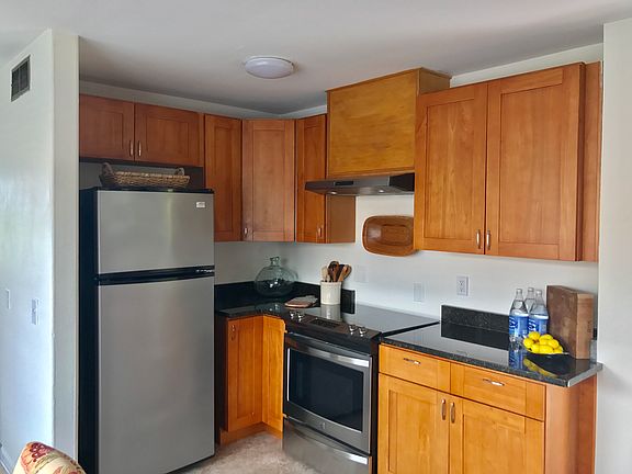 Stainless appliances and a gas stove.