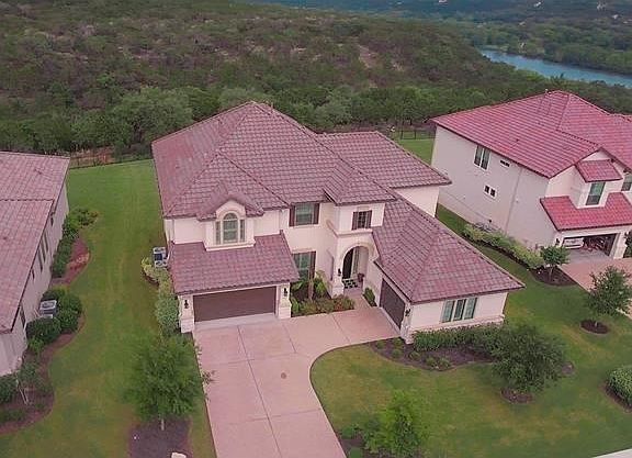 Set on a beautiful expansive lot with a backyard that overlooks miles of rolling terrain, this is your place to call home in Steiner Ranch!