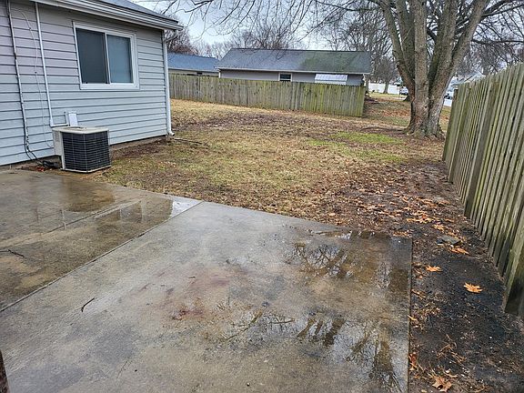 SMALL PATIO OFF GARAGE