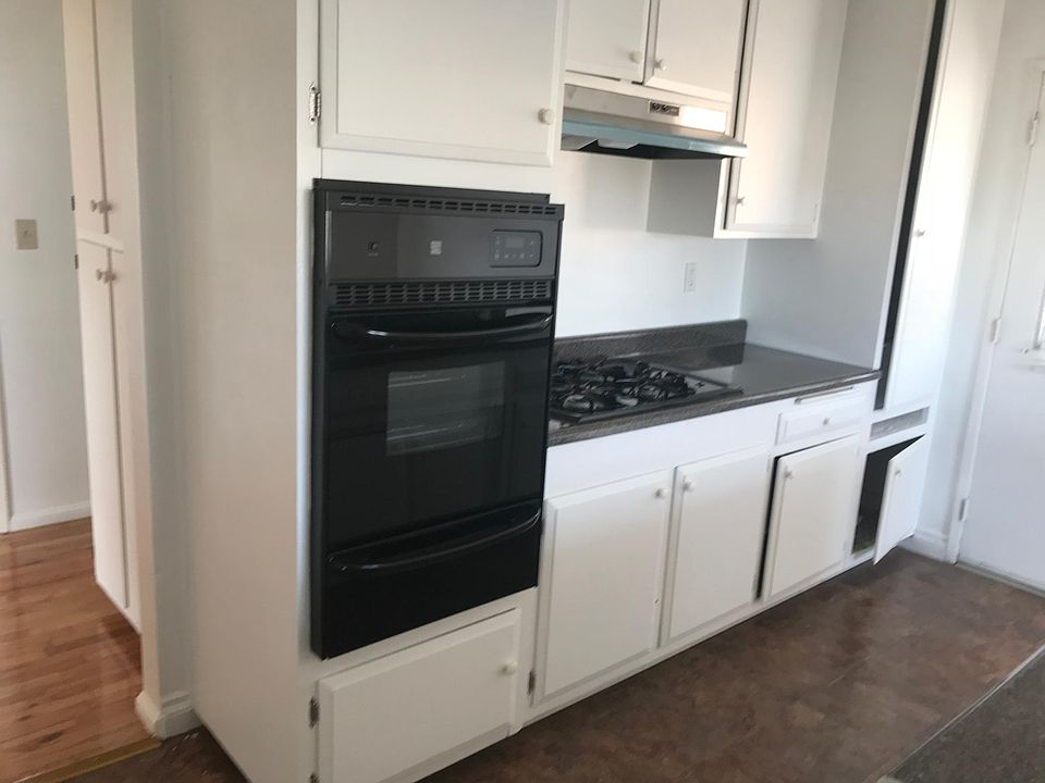 Kitchen with oven, gas range, and brand new stainless steel 