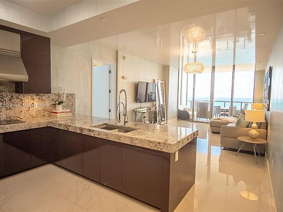 2nd image of 9703 E Collins Ave Penthouse 15