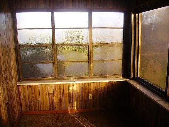 ENCLOSED FRONT PORCH