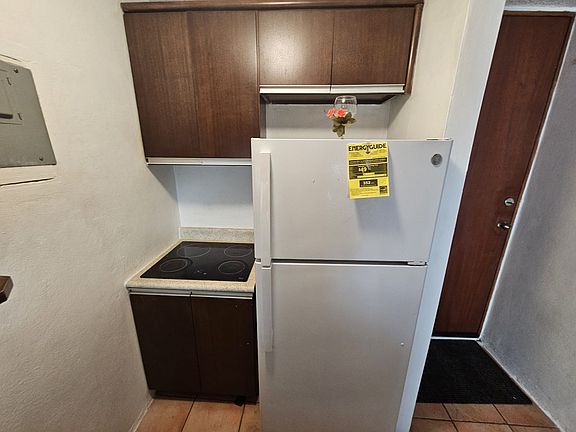 Kitchen with double sink, new microwave and new fridge. Plenty of cupboards and storage space (way more not seen in the pictures), will update with more pictures soon (or ask for a visit)