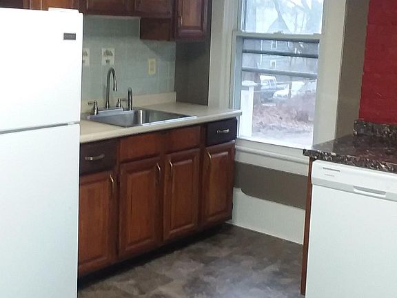 Roomy kitchen, laminate flooring, pantry storage, dishwasher!