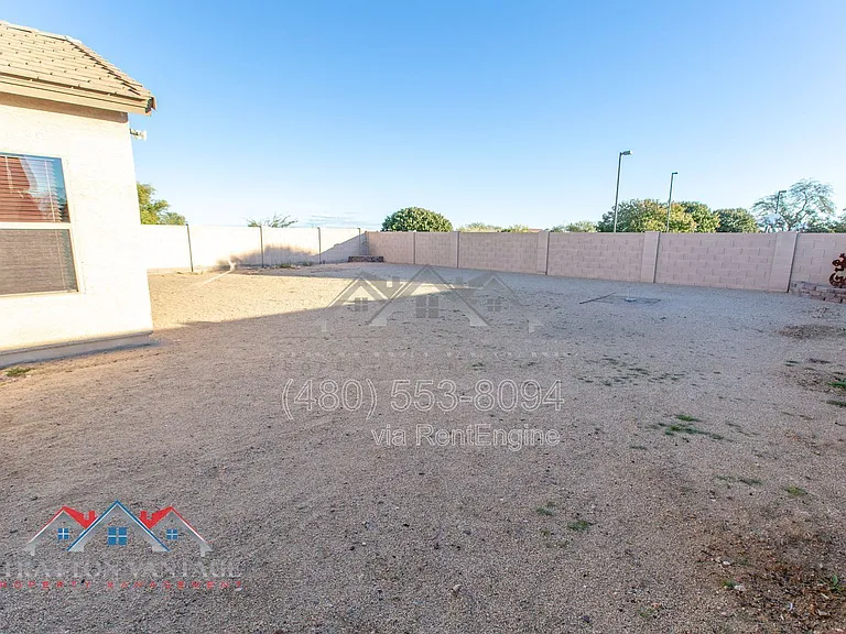 11751 W Daley Ln — Photo 40