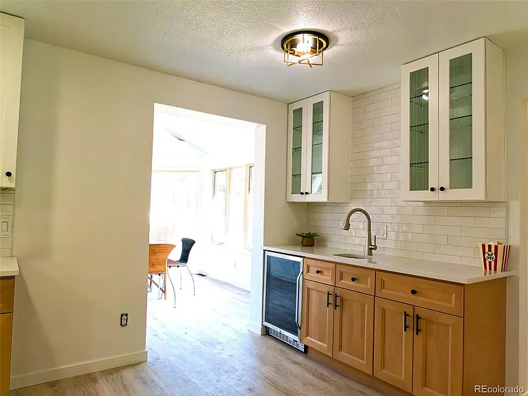5927 S Yates Ct — Photo 4