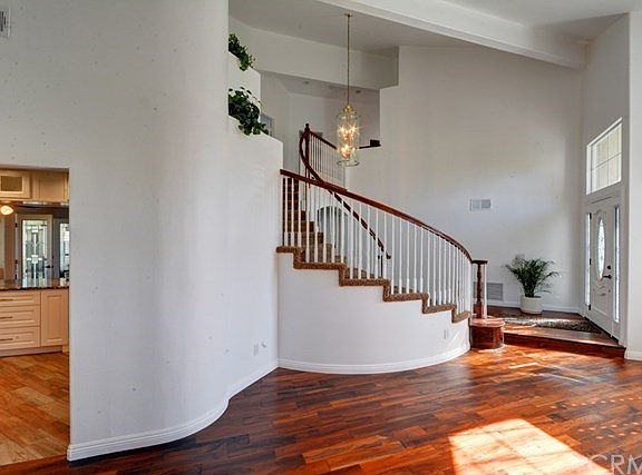 Formal entryway under high vaulted ceiling