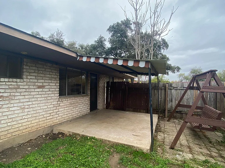 Private side patio and gated entrance