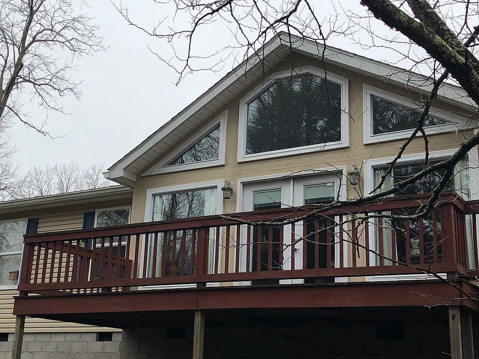 Large deck on front of house