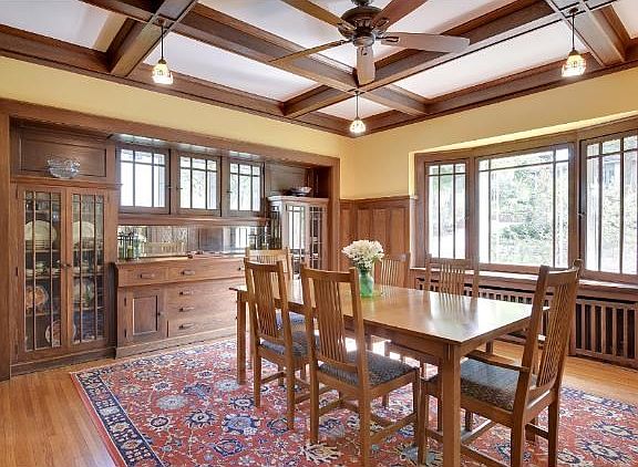 Dining room with pocket doors and built-ins, all in A+ condition.