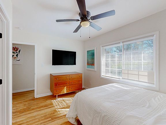 Double windows look out over the street