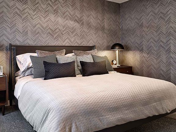 A photo of the primary bedroom of the Wicklow show home in Calgary by Brookfield Residential