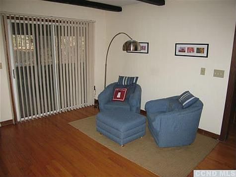 French doors to large three season glazed/screened entertaining porch