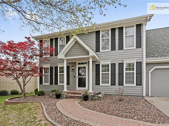 The beautiful, yet low-maintenance landscaping provides great curb appeal