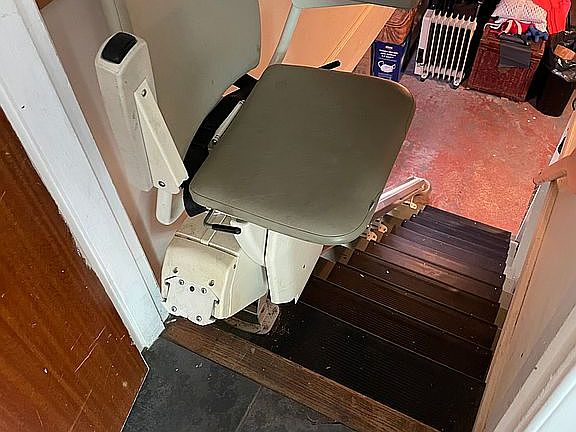 Power lift chair to basement