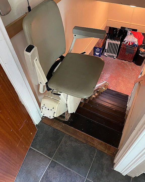 Power lift chair to basement