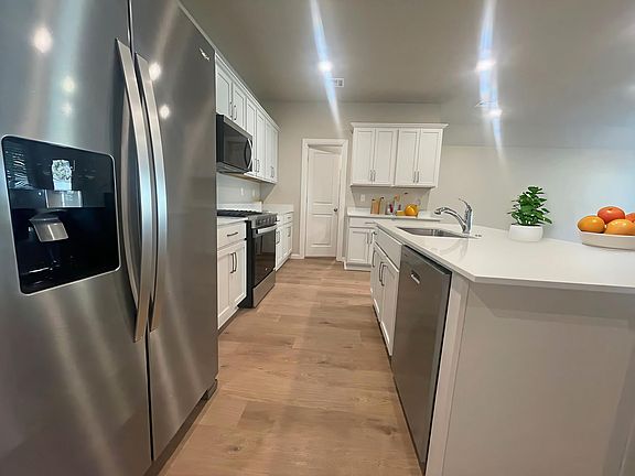 Kitchen with large pantry, refrigerator included