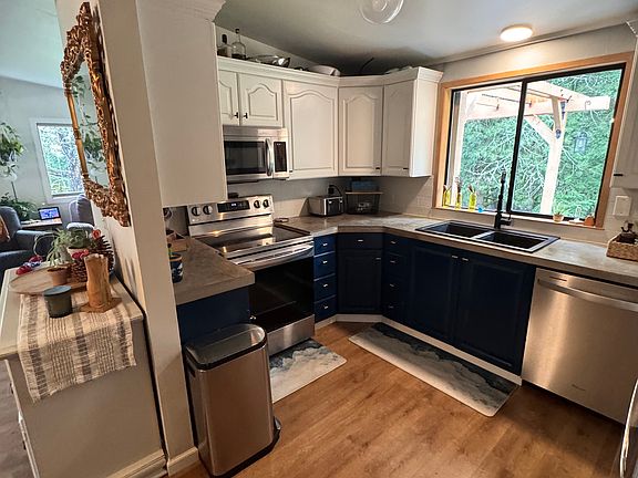 Kitchen with woods view