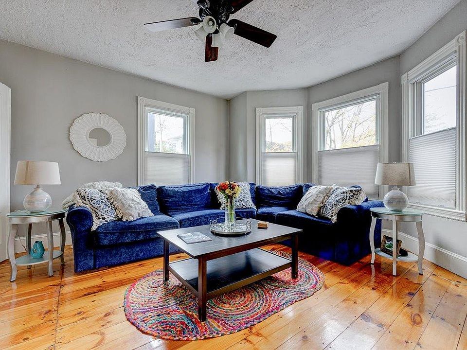 Living room! Love Sac couch to sink into!