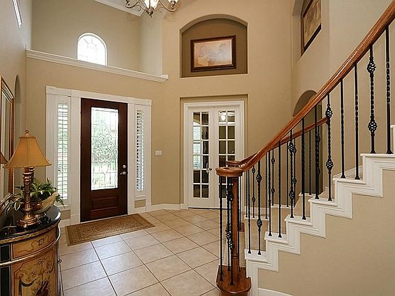 Views of foyer and study with french doors