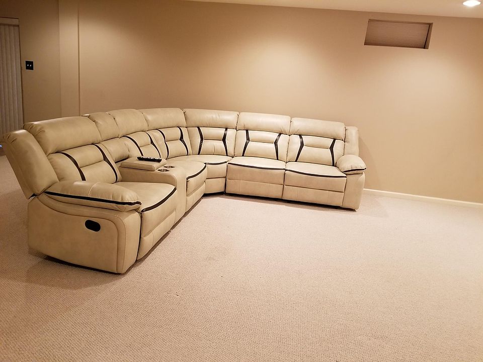 Living area with new recliner leader sofa